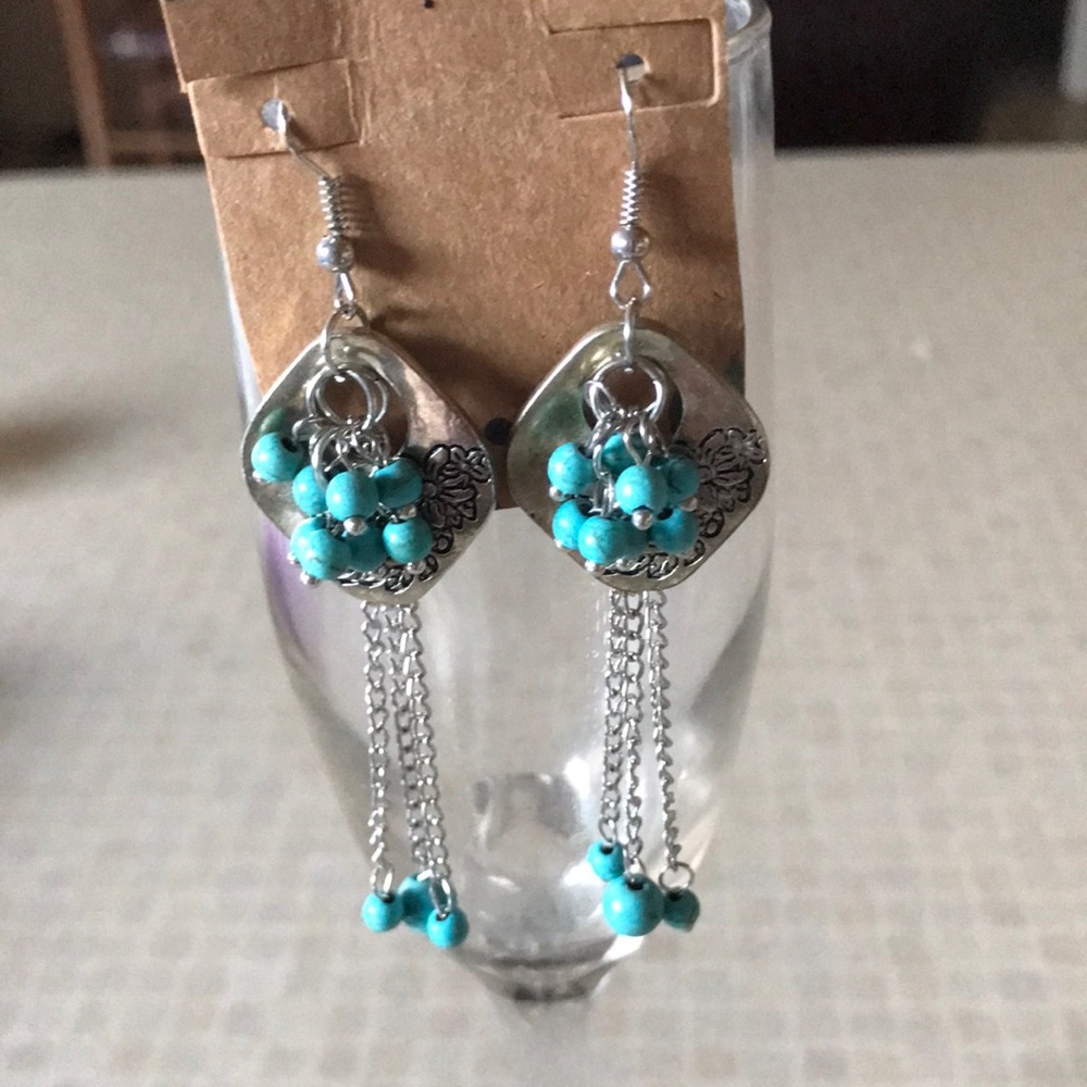Southwestern style dangle pierced earrings Silver tone and turquoise.